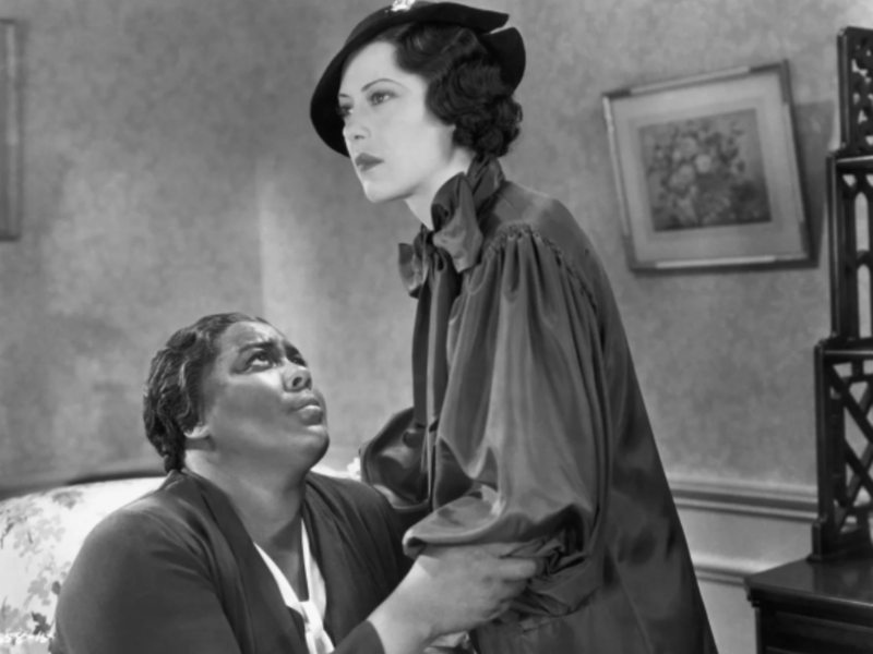 Black and white photograph from Imitation of Life film. Mix Society Magazine - Imitation of Life (1934), The Human Stain (2003), Passing (2021) - whiteface in media -